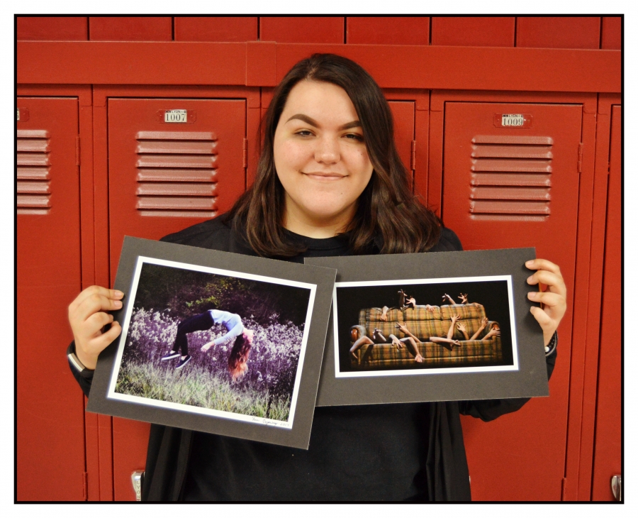 Picture of the winner and her art.